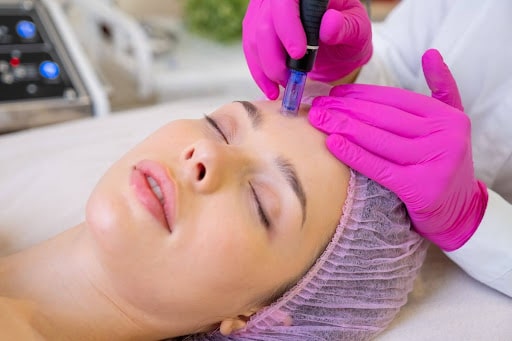 woman undergoing a facial treatment